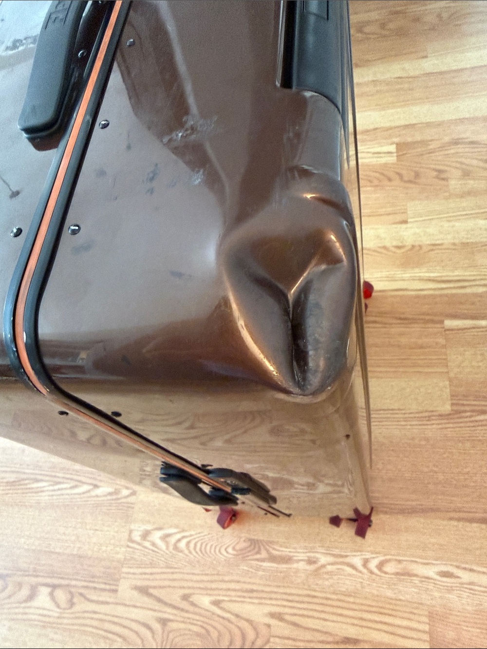 Floyd Brown Hardshell Suitcase with Bright Orange Interior and Red Wheels - Picture 17 of 17